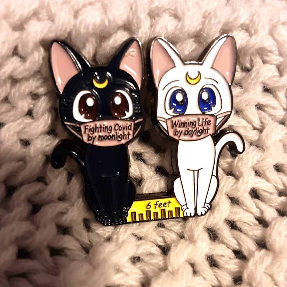 Luna lapel pin